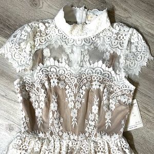 Lace feminine dress size small fully lined with two underneath